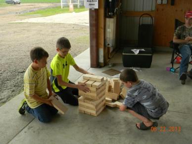 Playing Man-Size Jenga in the Ag Olympics area
